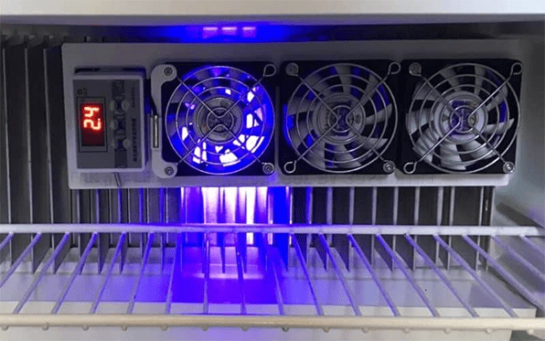 fin fan set installed in an absorption refrigerator for even refrigeration from rvingknowhow.com